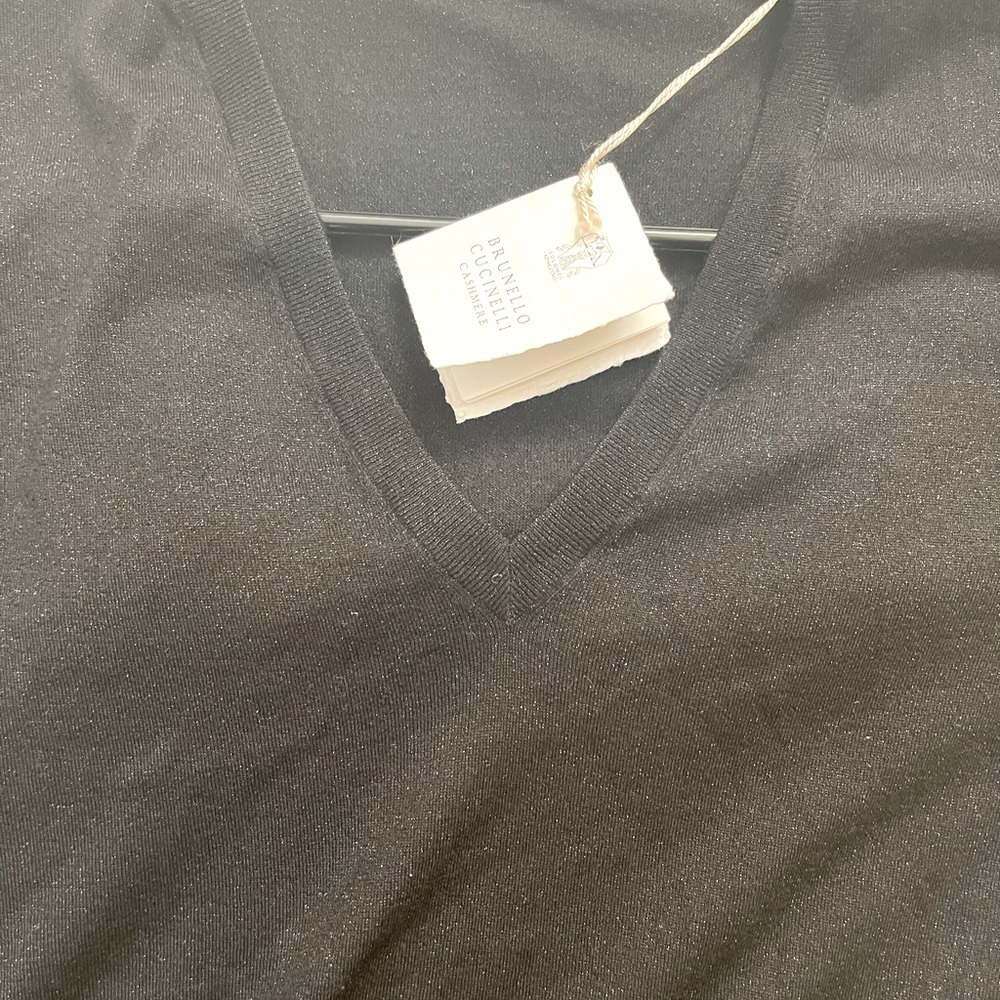 Brunello Cucinelli ribbed knit sweater with metallic accents.
Crew neckline.